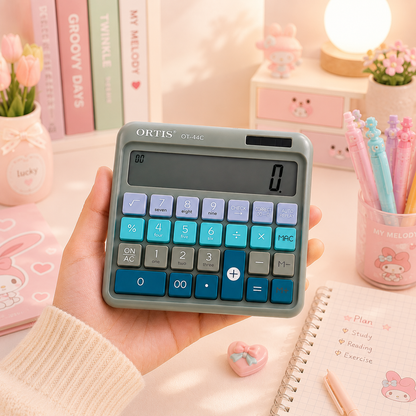 ORTIS OT-44C Calculator - held in hand pink room scene